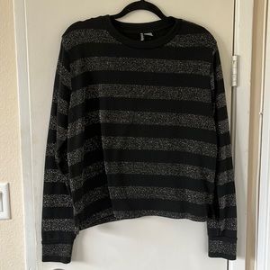 DIVIDED black long sleeve sweater with shimmer stripes. Size Large